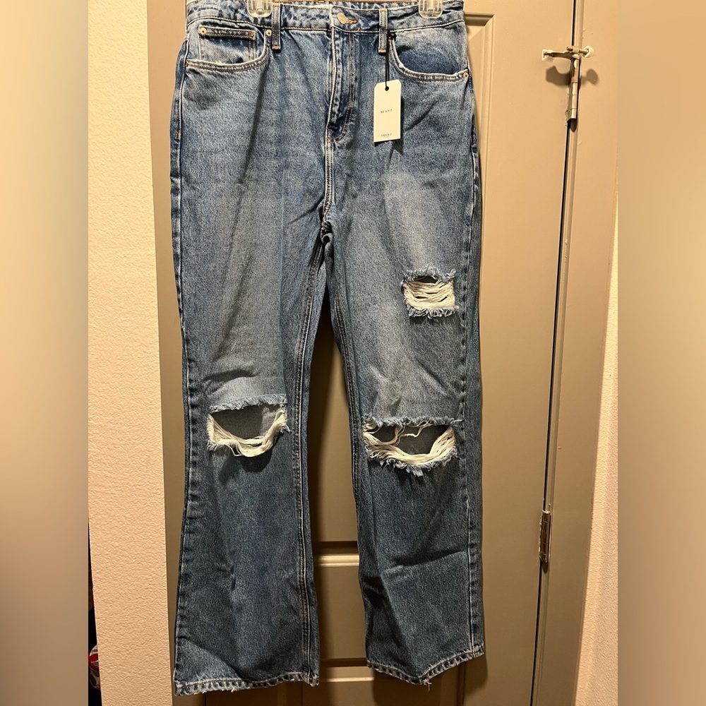 BRAND NEW 90s light wash distressed denim